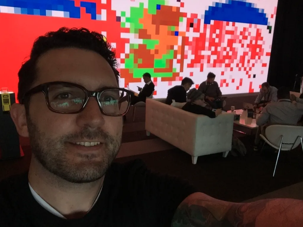 A photo of the Twilio video wall displaying pixel art of Link